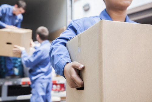 Office relocation planning in London with moving team and office boxes