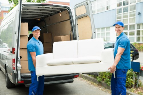 Man with a van team preparing a safe move with protective equipment