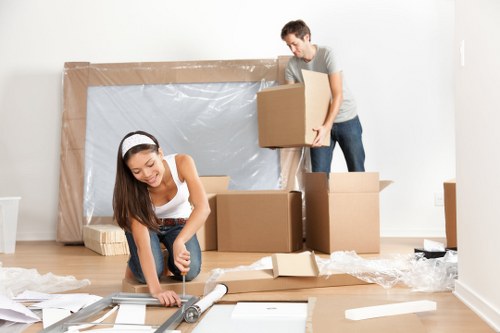 Commercial removal crew relocating office furniture in London