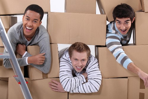 Boxes and furniture being loaded for a London home removal