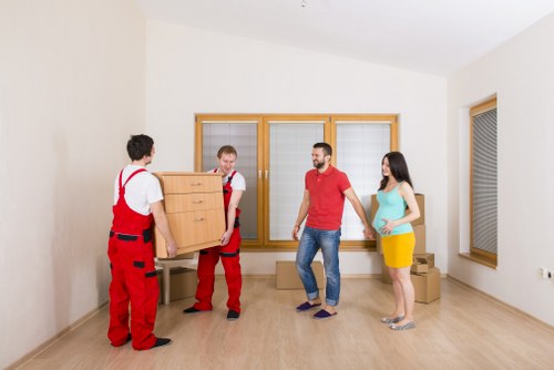 Packed boxes and furniture ready for removal in London