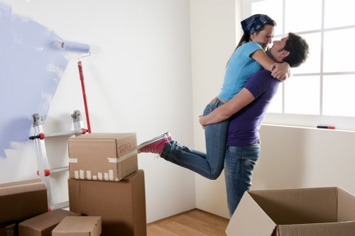 Removal van loading at a London apartment building with limited access