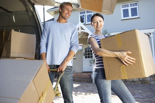 Office relocation team loading desks and chairs for a London business move