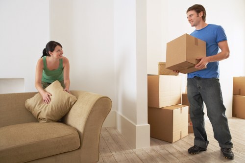 Removal team handling a city apartment move in London